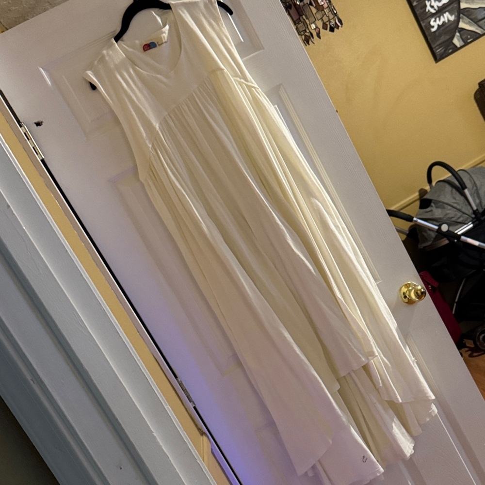 Free people Elegant Cream Sleeveless Dress